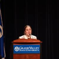 Woman speaking five